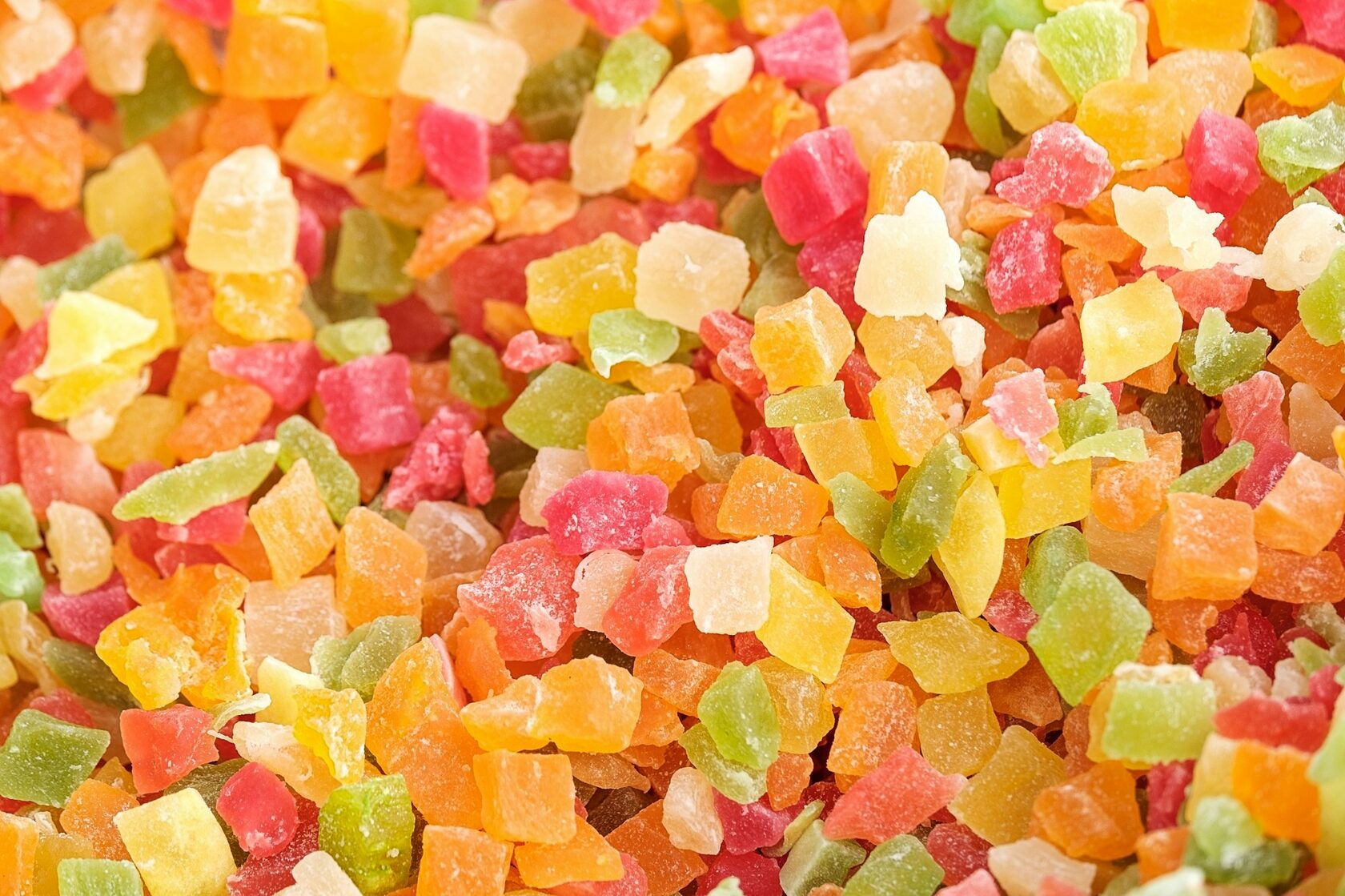 A round tropical-green Coin Volcano mixed-fruit candy